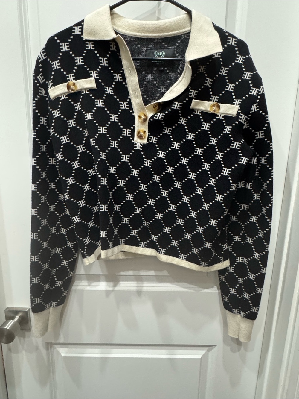 Black and Cream Patterned V-Neck Sweater with Button Detail